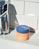 Defend Overnight Recovery Cream - closed jar on sink