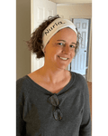 Woman wearing Nuria spa headband