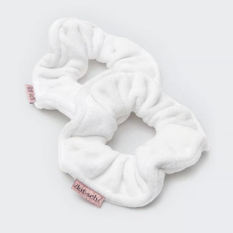 Kitsch white towel scrunchies on gray background