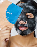 Nuria Defend Purifying Bubble Mask - woman with activated, bubbling mask on face