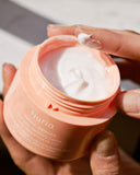 Defend Overnight Recovery Cream - open jar with cream on fingertip